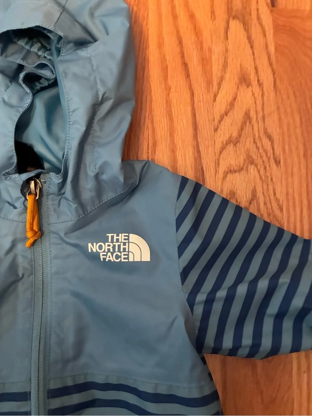 The North Face Infant ZIPLINE RAIN JACKET NIAGARA BLUE MINI STRIPE PRINT 6-12 mo